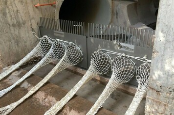 Instal.lació de malles de retenció de residus sòlids als sobreeixidors de xarxa de clavegueram que dona al riu Ges